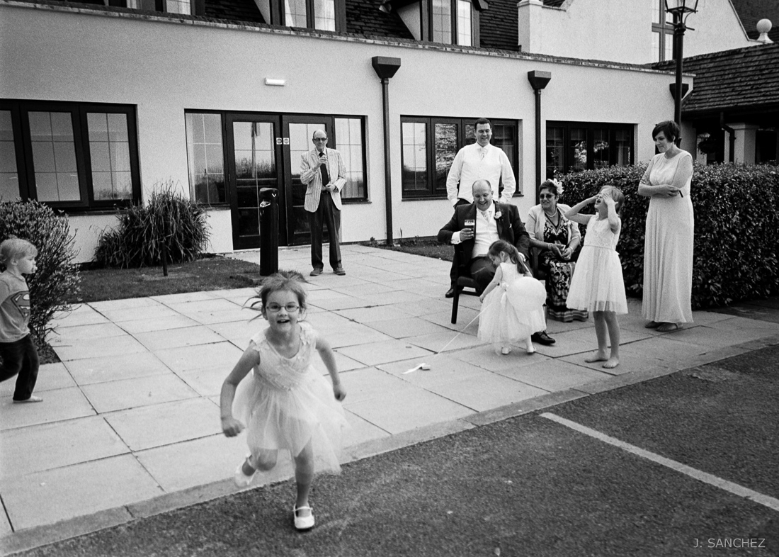 film photography, kids having fun at a wedding