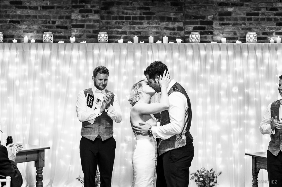 The first kiss, documentary wedding photographer