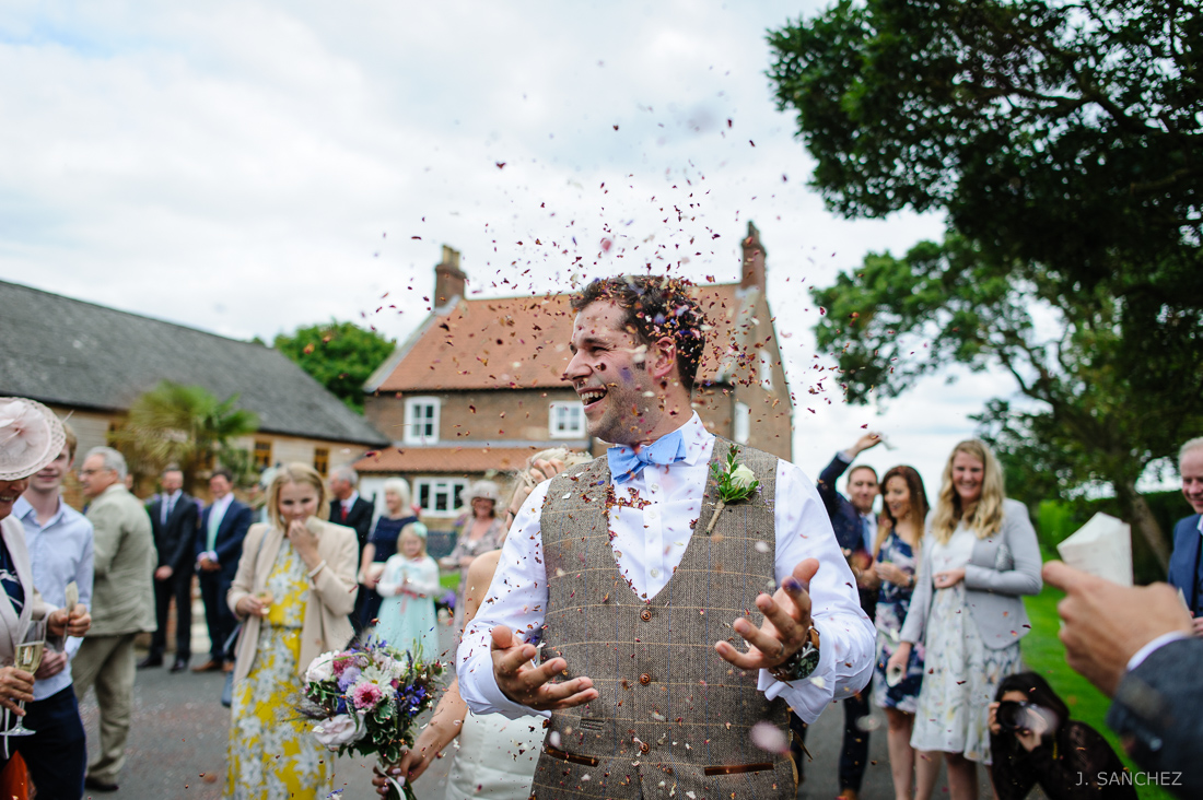 Confetti time, the groom