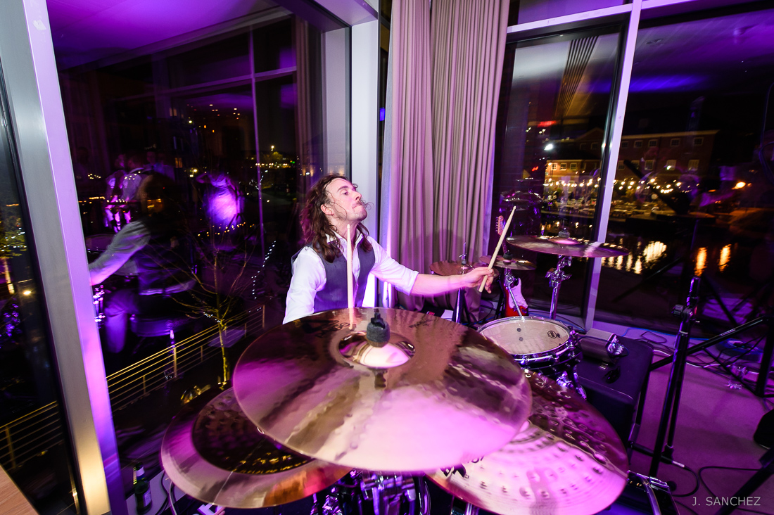 Groom playing drums at a Leeds Wedding